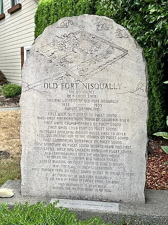 Old Fort Nisqually monument in front of the DuPont Historical Museum in DuPont, Washington.